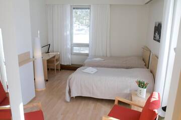 Фото номера Двухместный номер с 2 отдельными кроватями Отель Hotel Norrvalla г. Vöyri 10